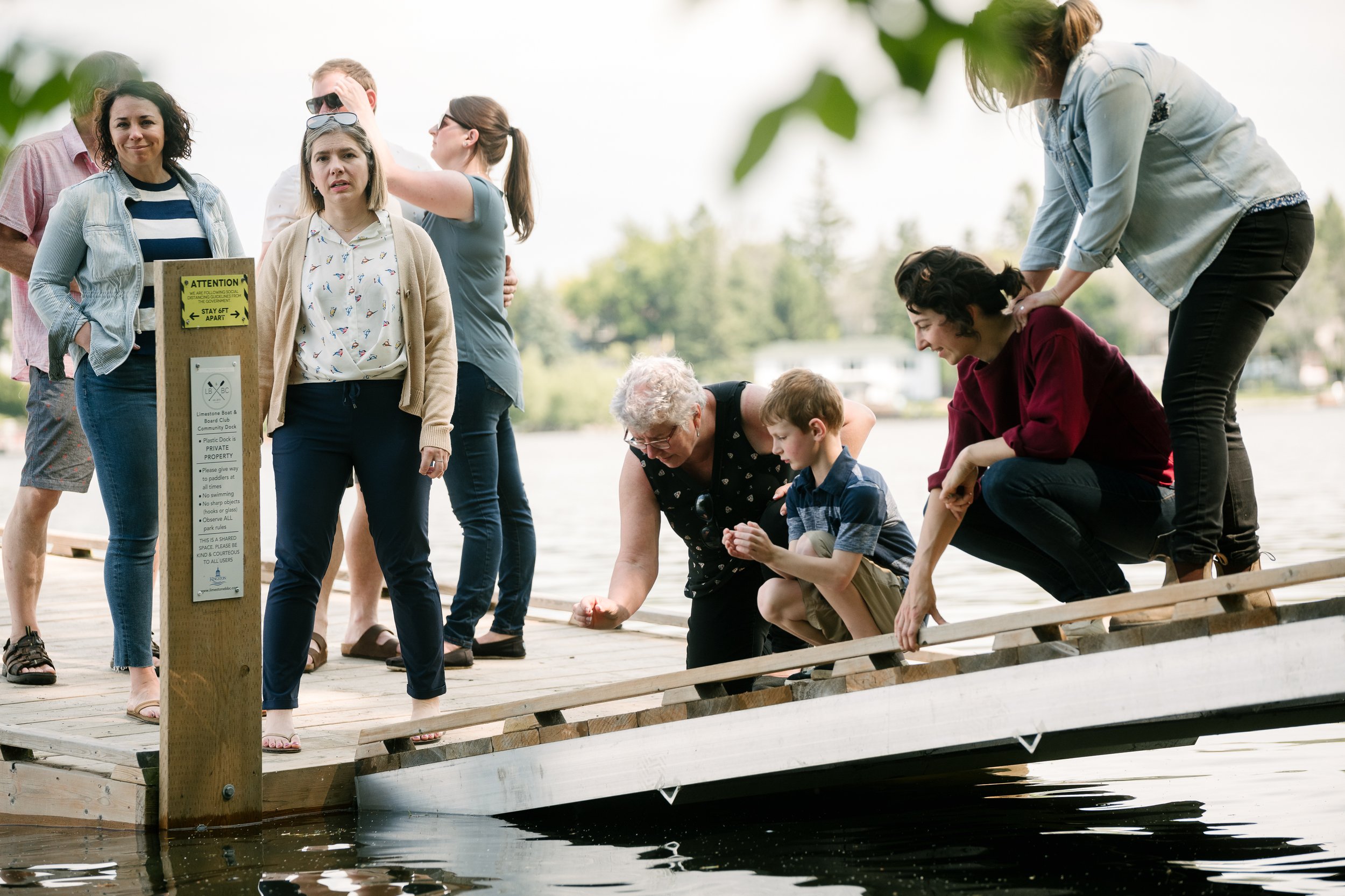 Family enjoying together near the lake