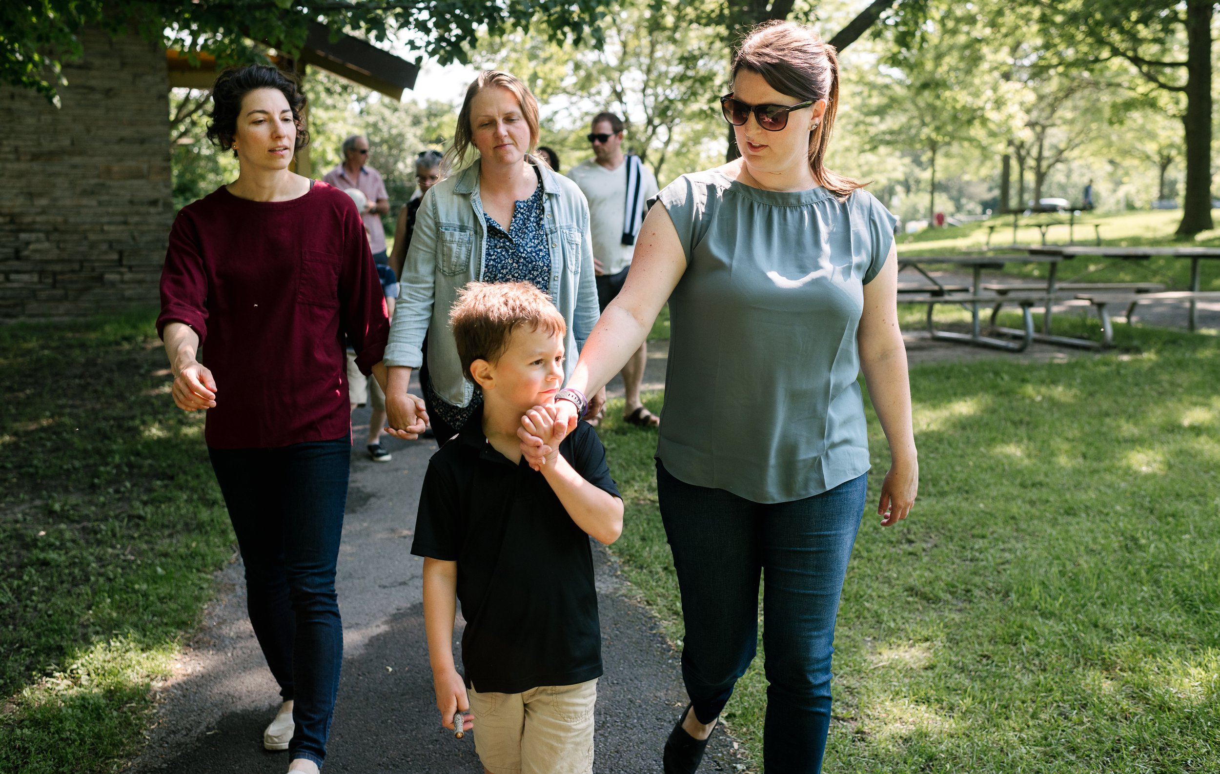 family walking in the park