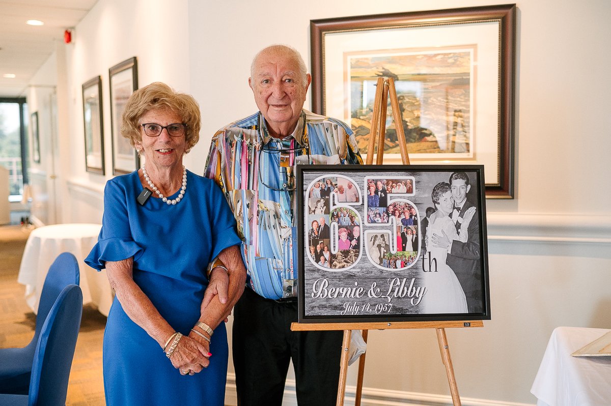 Elderly couple posing in the anniversary party