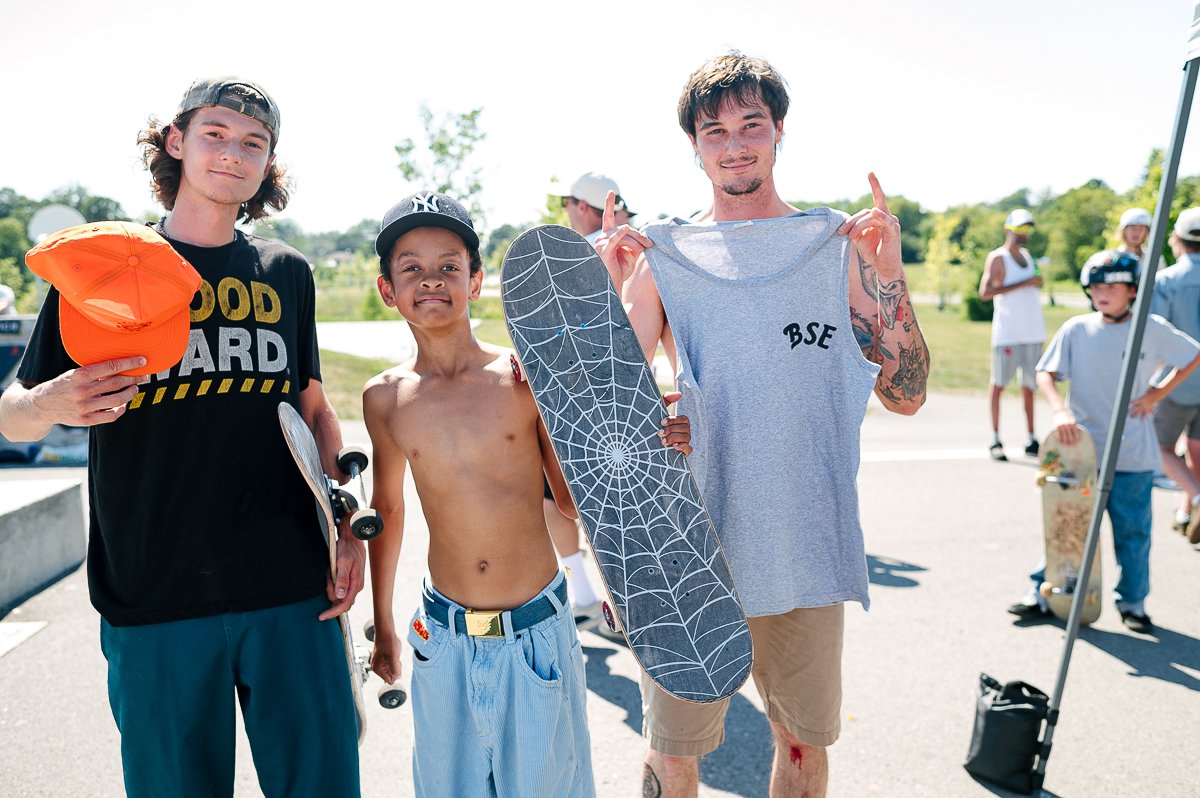 Skaters ready for skating event with their stuff.