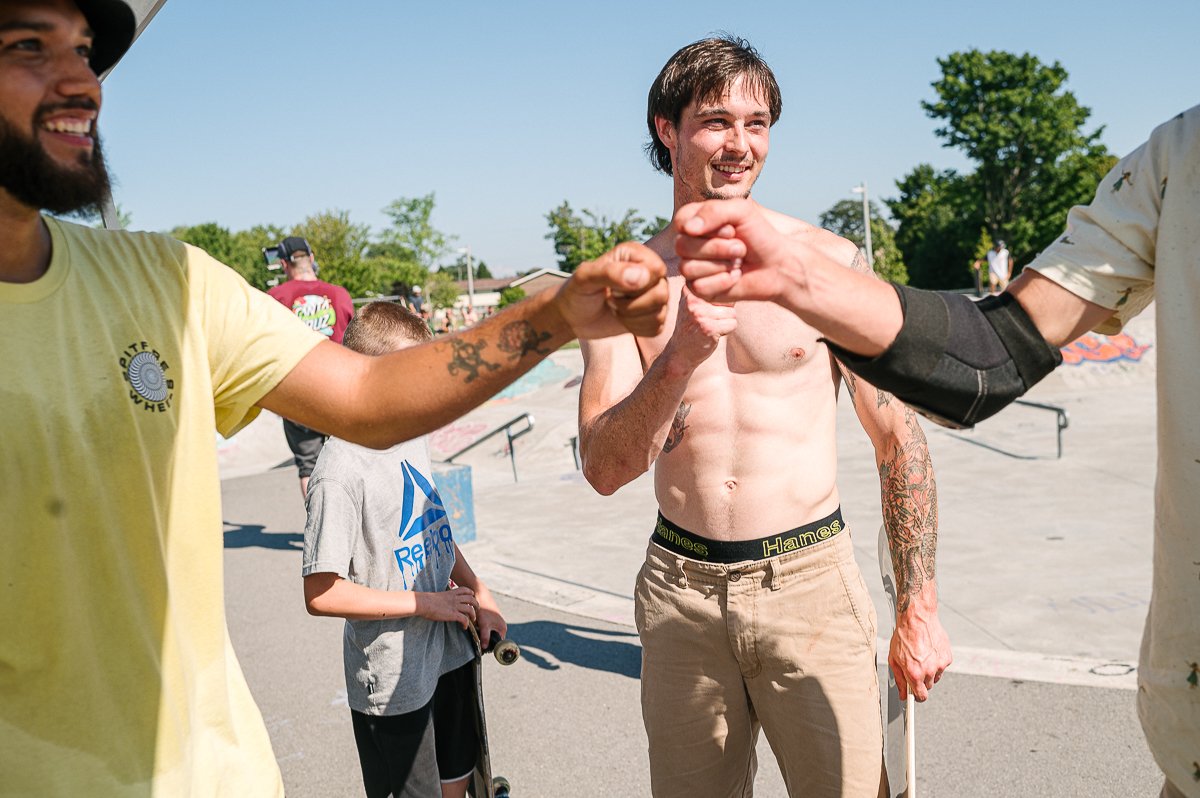 Skaters celebrating skating event in Kingston.