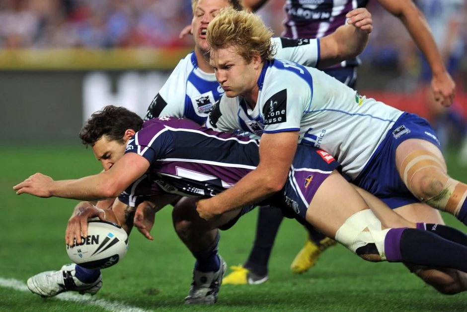 Billy Slater scoring one of his 188 career tries in the NRL.