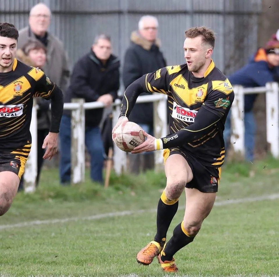Nathan Slater (right) making a break for Skirlaugh
