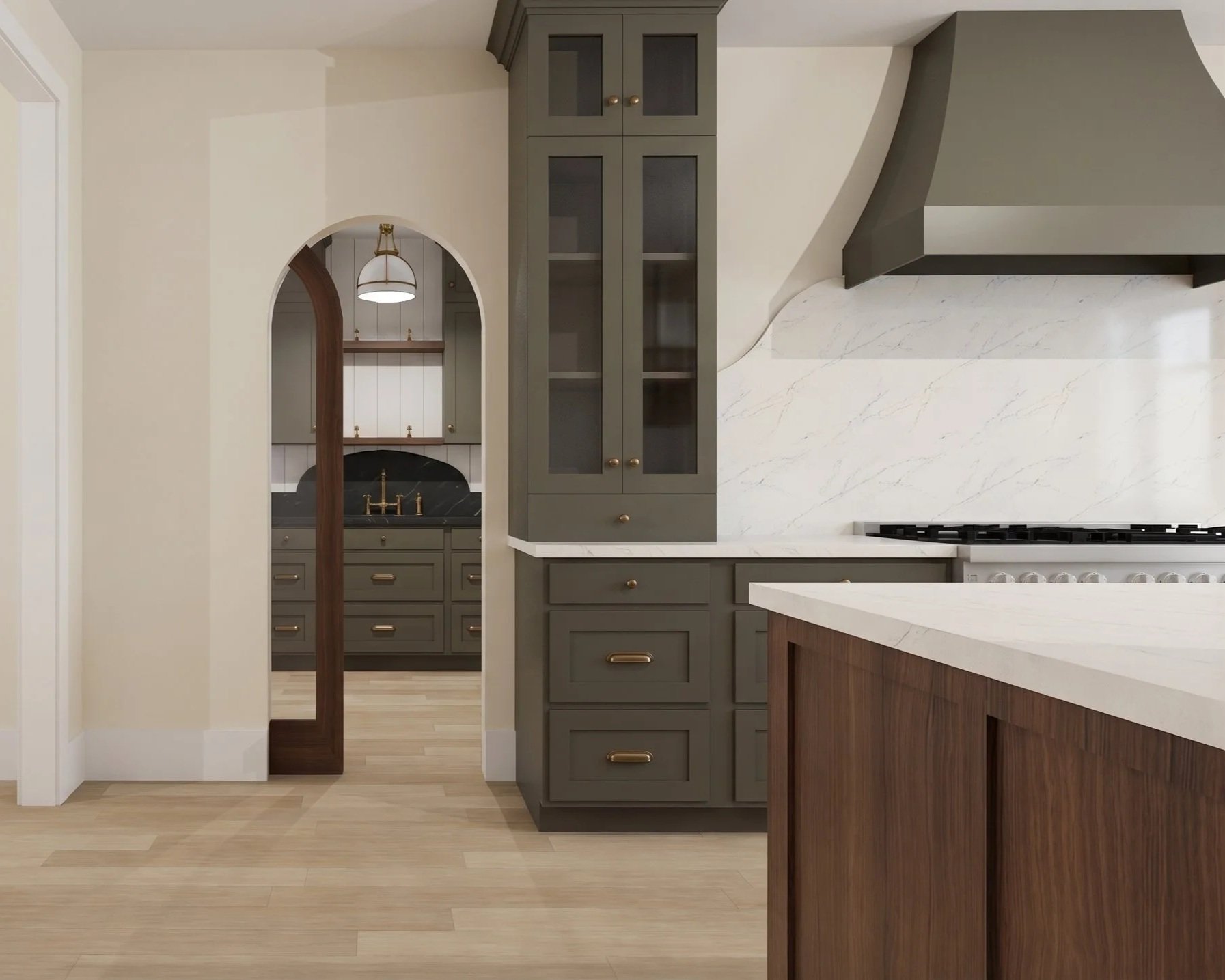Interior of a modern kitchen with green cabinets, a white marble backsplash, a range stove, and a wooden kitchen island.