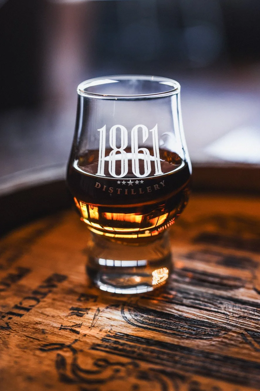  Bourbon in a tasting glass photographed by commercial food photographer, Daniel Shippey. Nashville photographer. Atlanta photographer. Savannah photographer. 