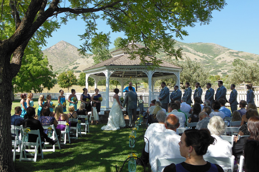 wedding-ceremony-in-the-backyard-of-the-brigham-young-farmhouse.jpg
