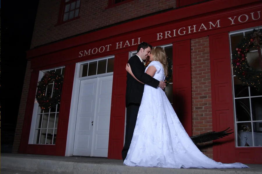 bride-and-groom-standing-outside-smoot-hall.jpg