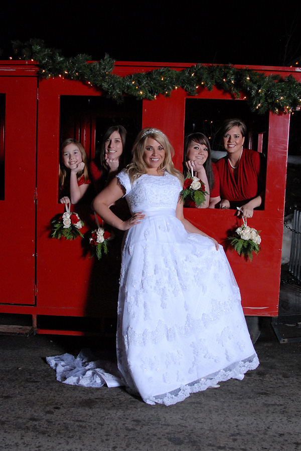 bride-and-bridesmaids-in-front-of-train.jpg