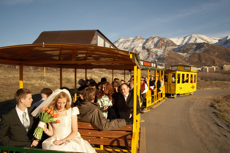 bride-groom-and-guests-taking-a-ride-on-the-train.jpg