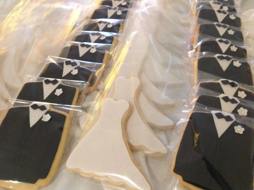 Bride & Groom Butter Cookies iced with fondant. Decorations fully edible! individually wrapped.