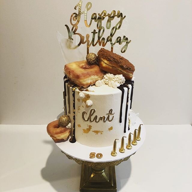 Happy 50th Clint! Cake featuring @topdupdonuts Classic Vanilla Bean &amp; Salted Caramel Biscotti delicious donuts! Mmmmm #thesweetersidecakes #perthcakes @sweet.stamp