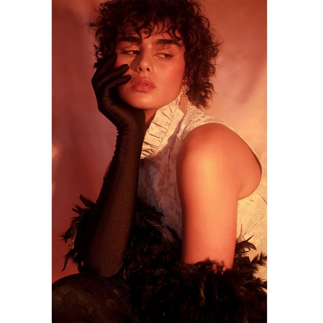 @liviatang___ ruffled jacquard top featured in @notion worn by @jilla.tequila