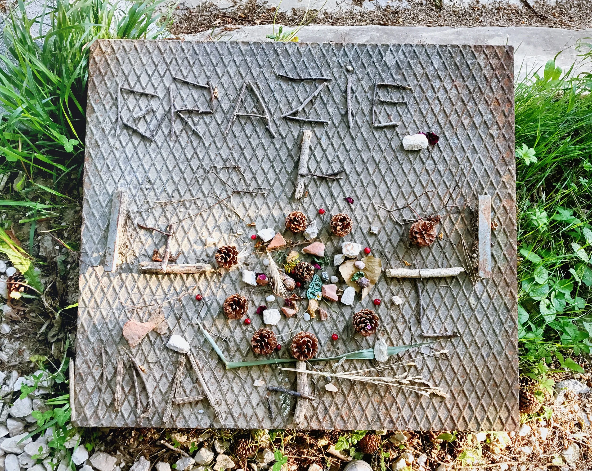 During the retreat, this little piece of art slowly emerged by the walking area. 