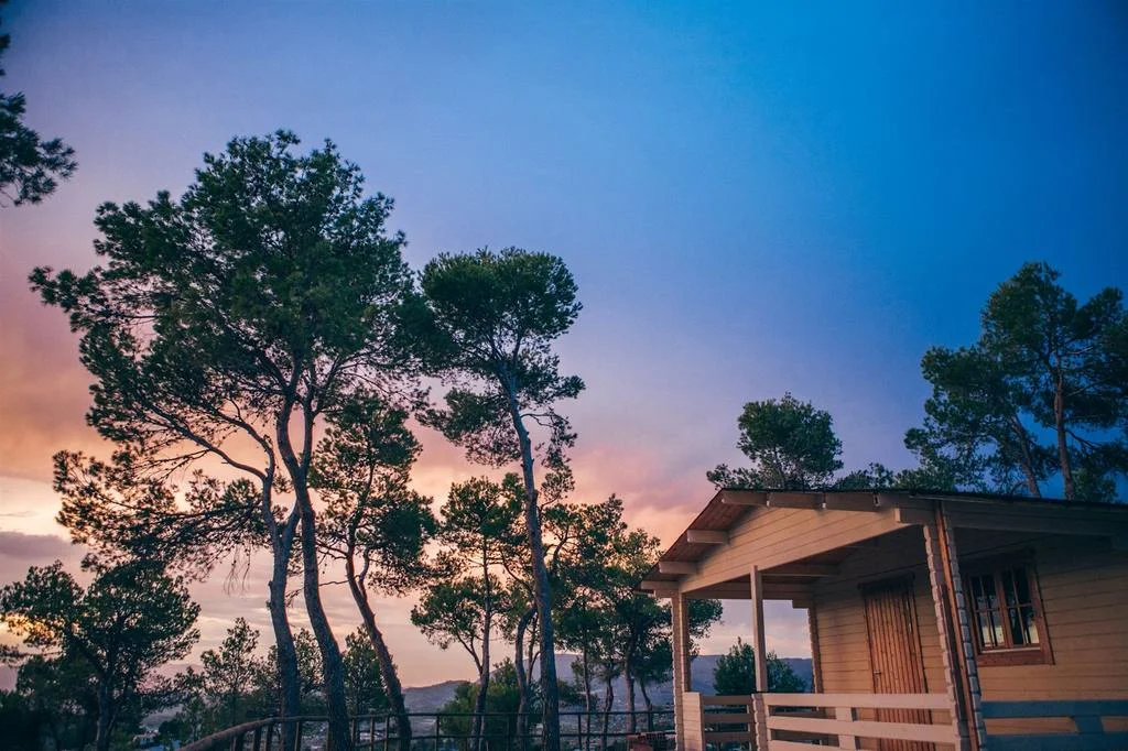 create-generate-hotel-la-escondida-cabin-dusk-view.jpg