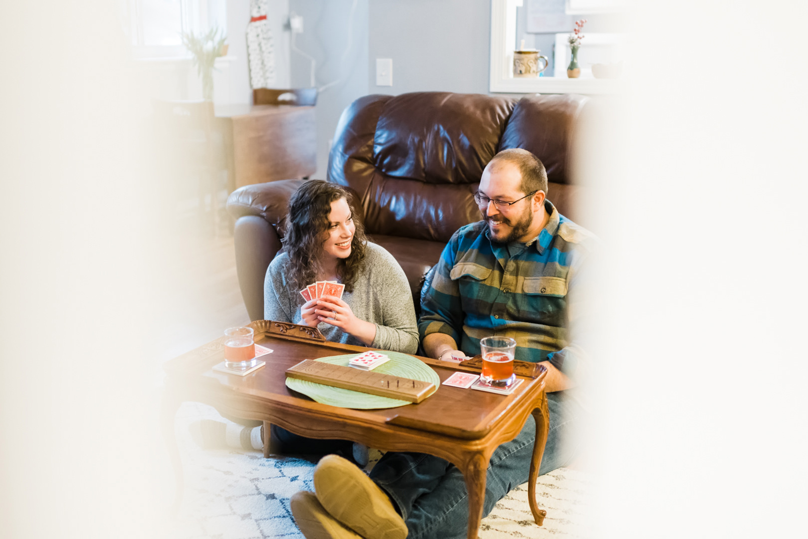 Couple smiling while playing cribbage