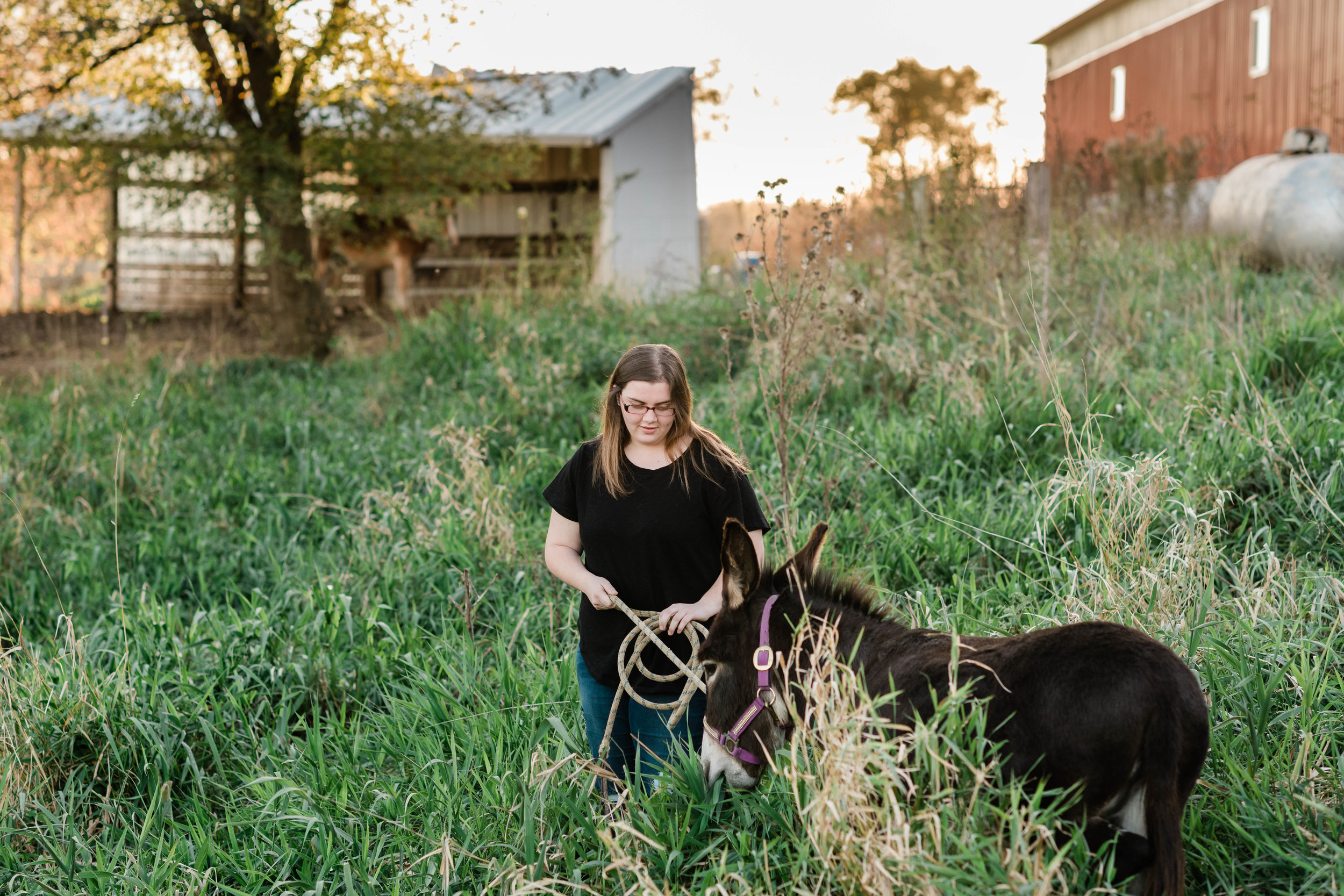 High school senior walks with her donkey