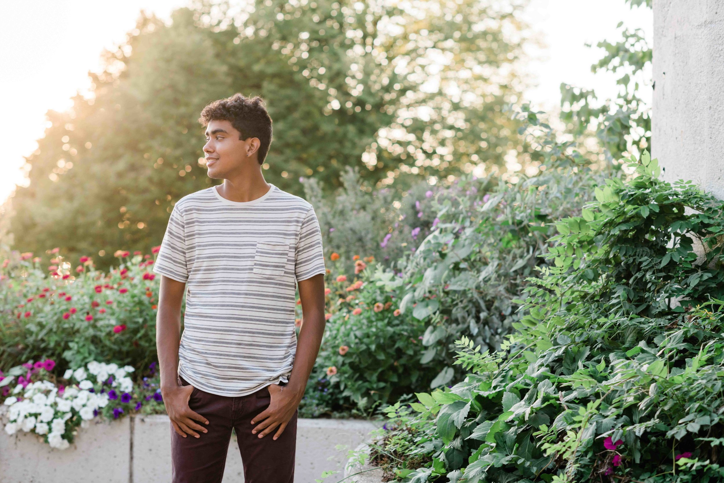 High school senior standing at James Madison Park in Madison, Wisconsin