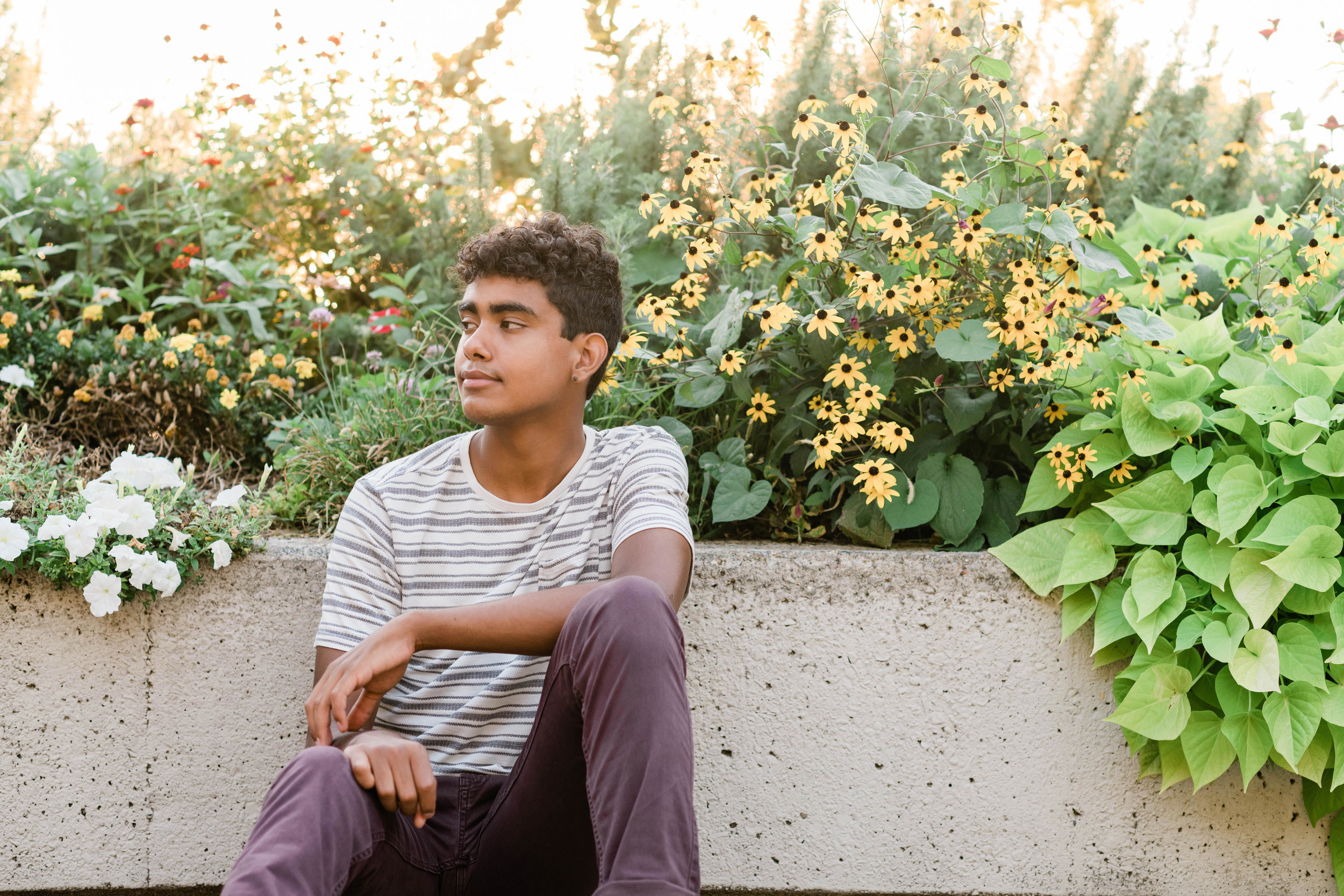 High school senior sitting at James Madison Park in Madison, Wisconsin