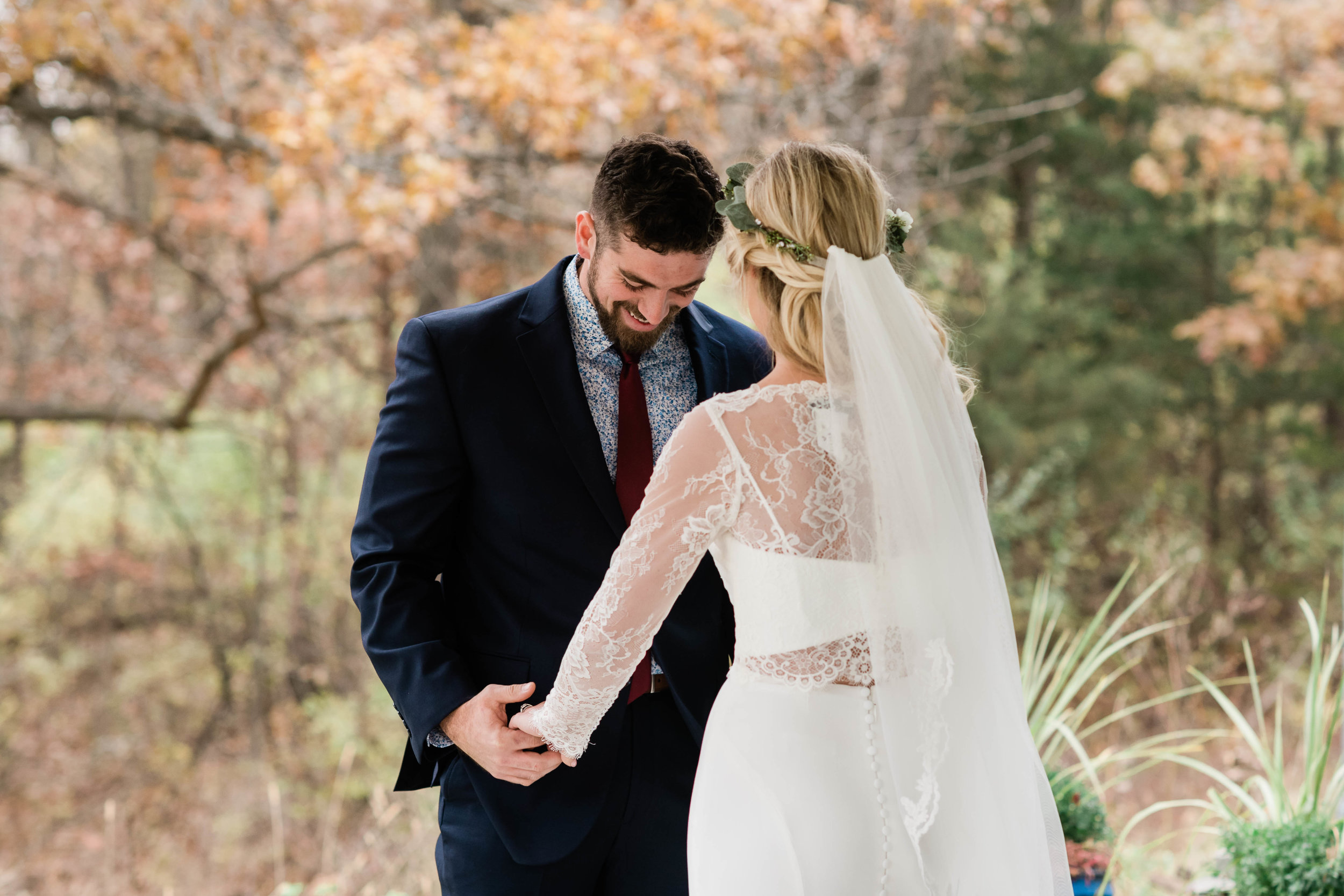 Bride and groom sharing a first look on their wedding day