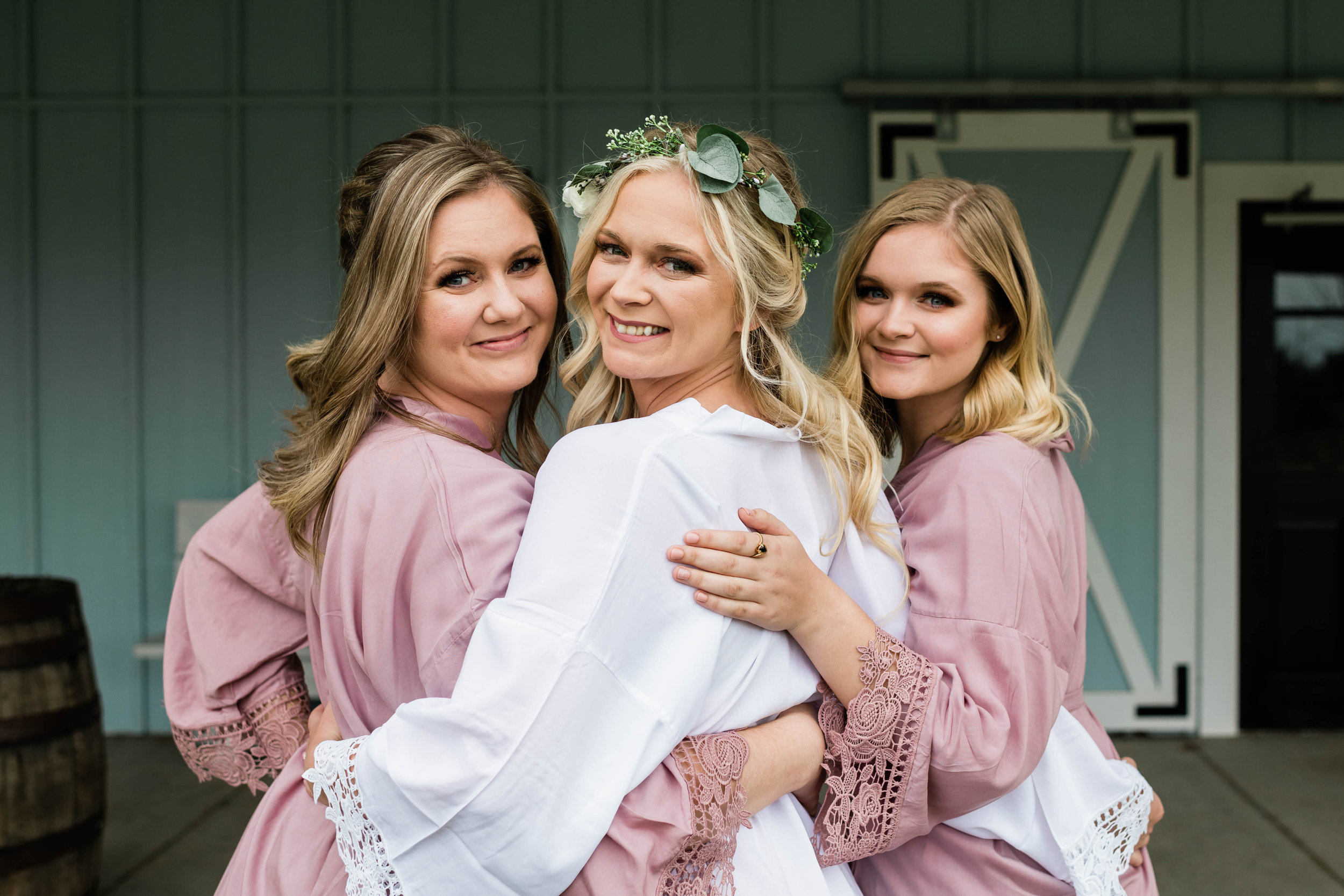 Bride and her bridesmaids in robes