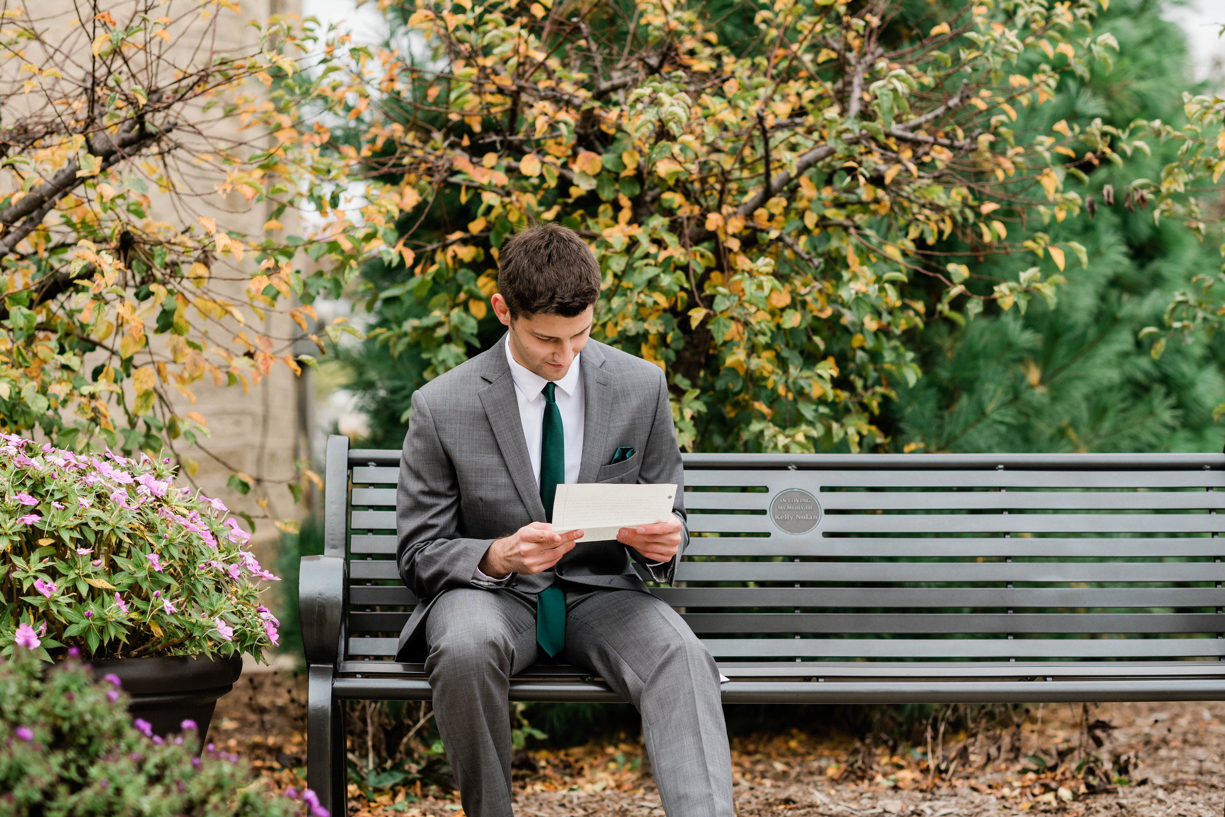 Groom reading a letter from his bride