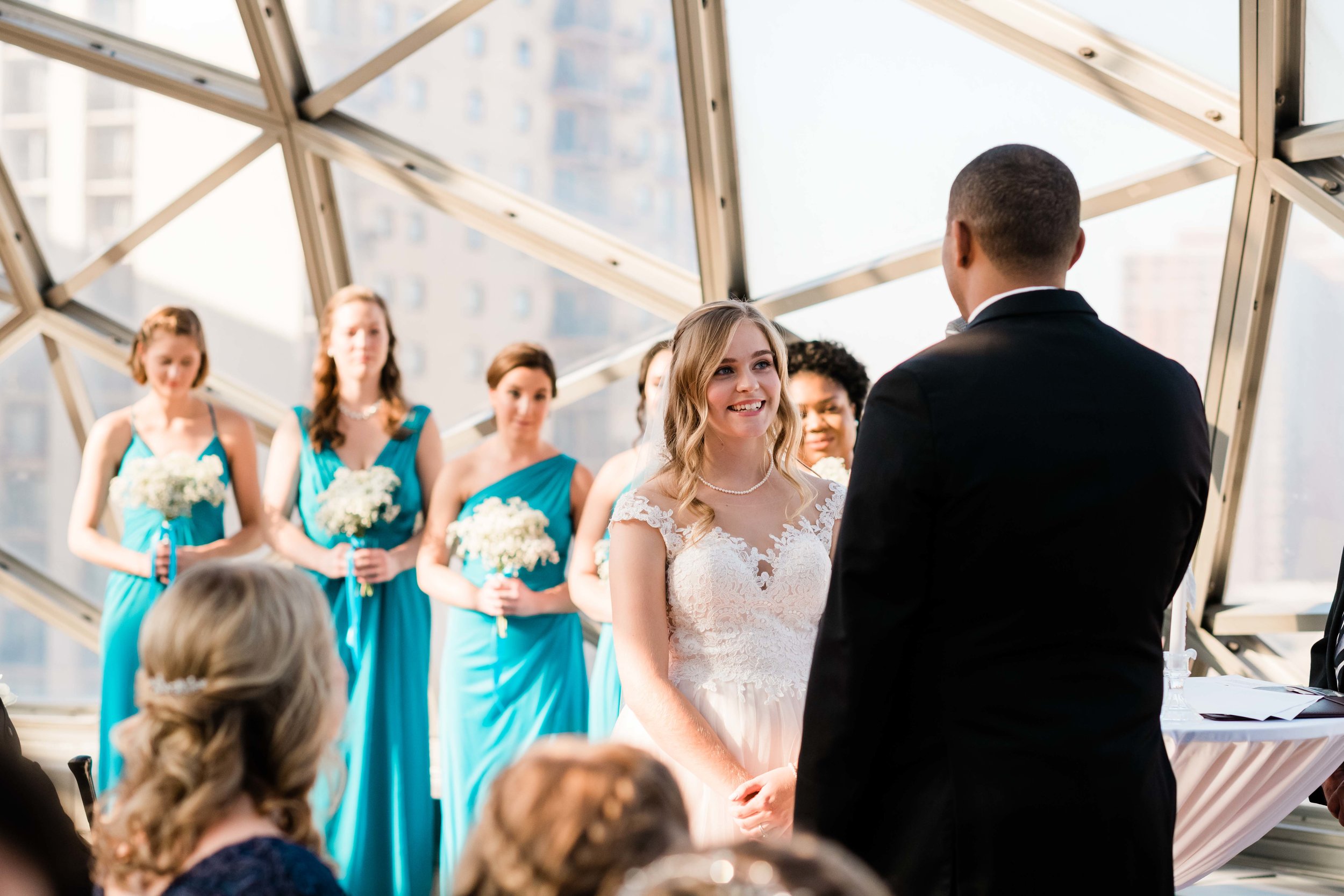 Bride looks at groom during the ceremony