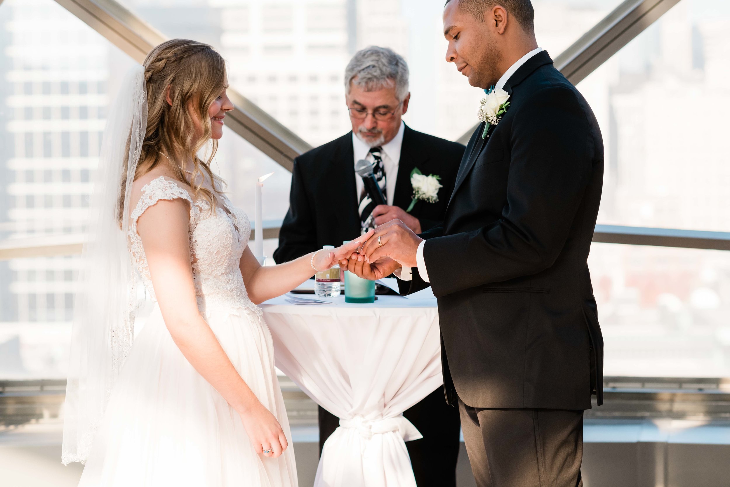 Bride and groom exchange rings