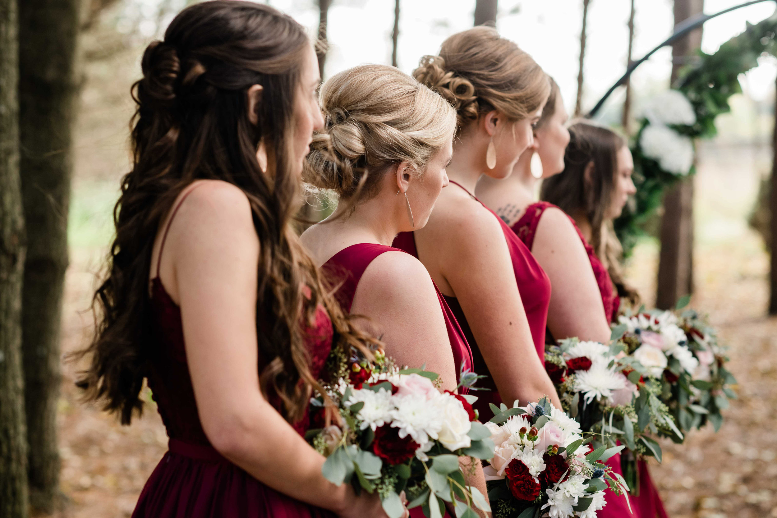 Bridesmaids lined up during ceremony