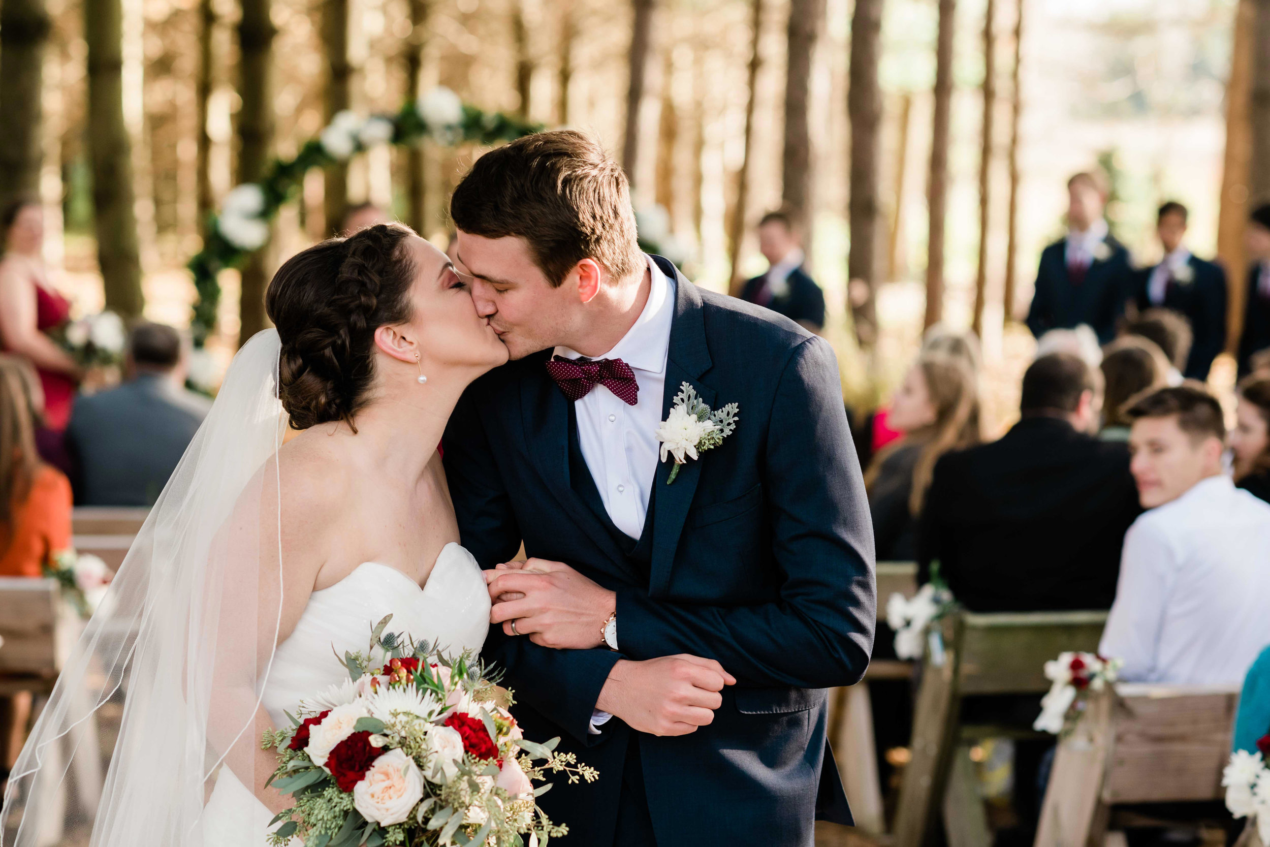 Bride and groom first kiss