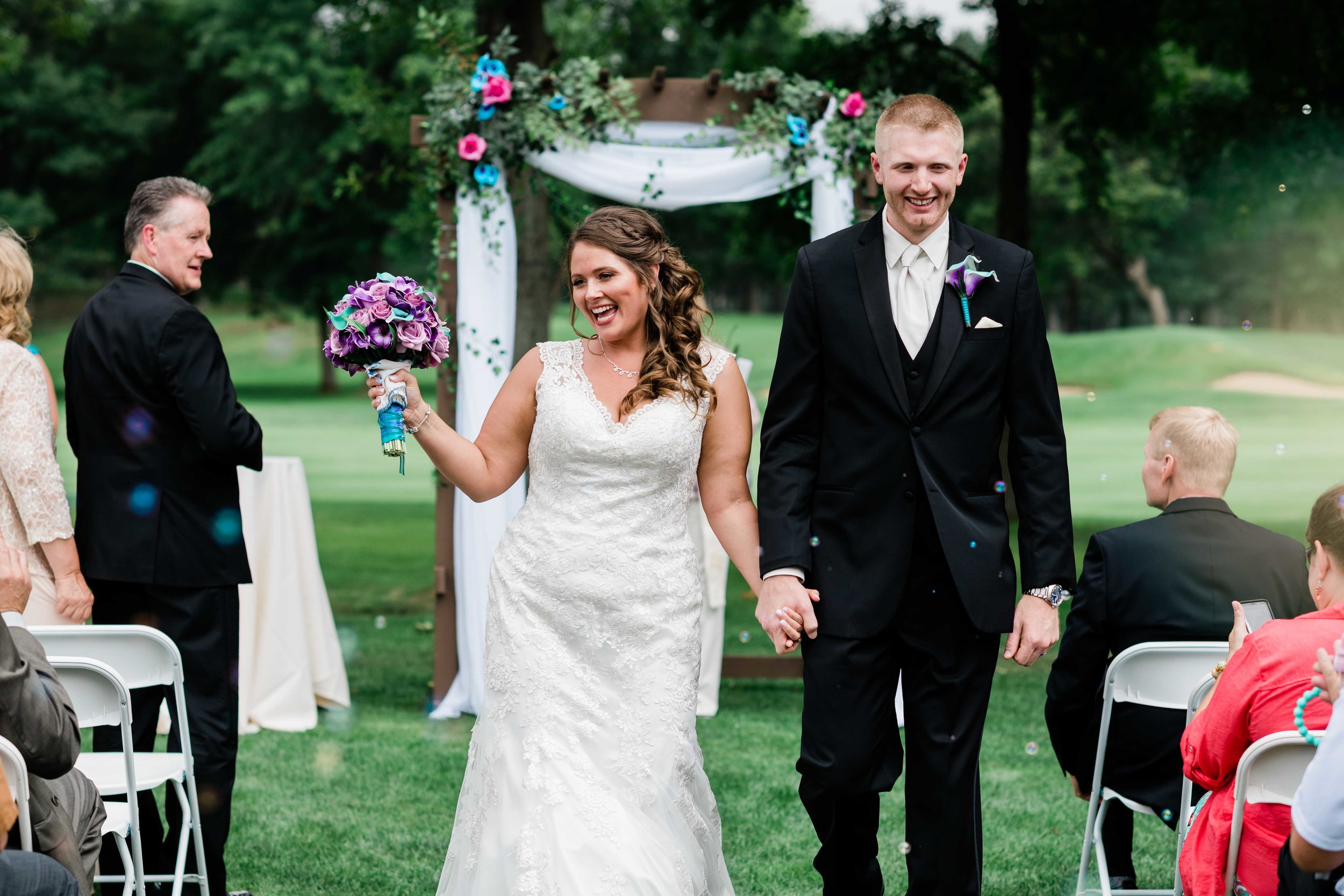 Bride and groom wedding ceremony bubble exit