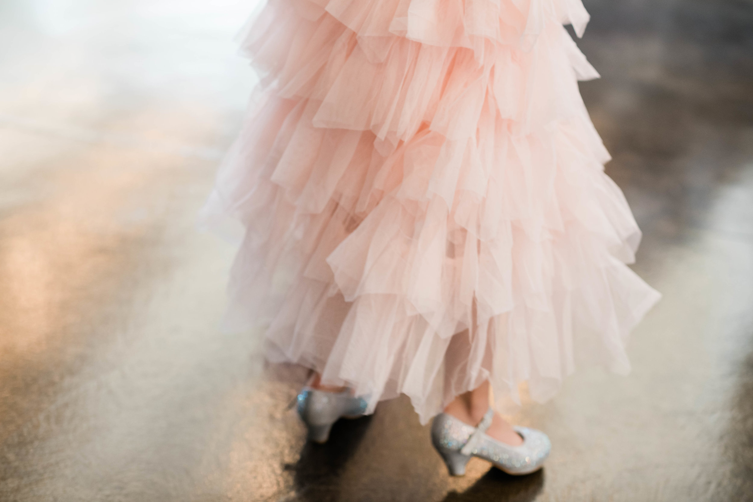 Flower girl spinning her skirt