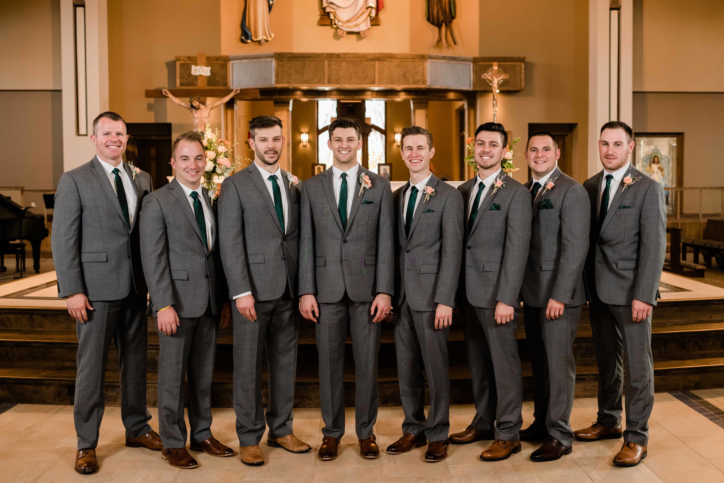 Groom and his groomsmen at the altar