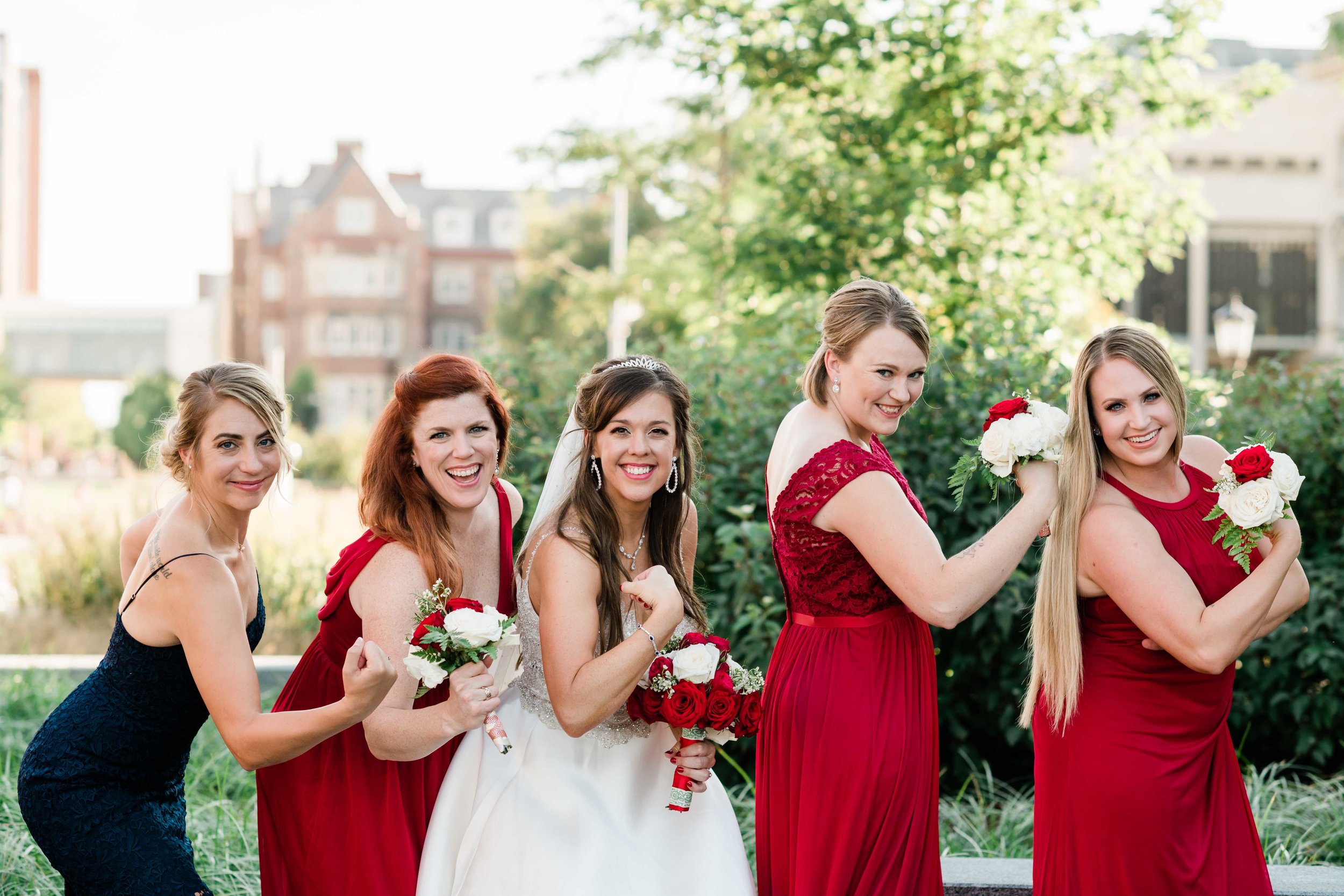 Bride and bridesmaids show off their biceps