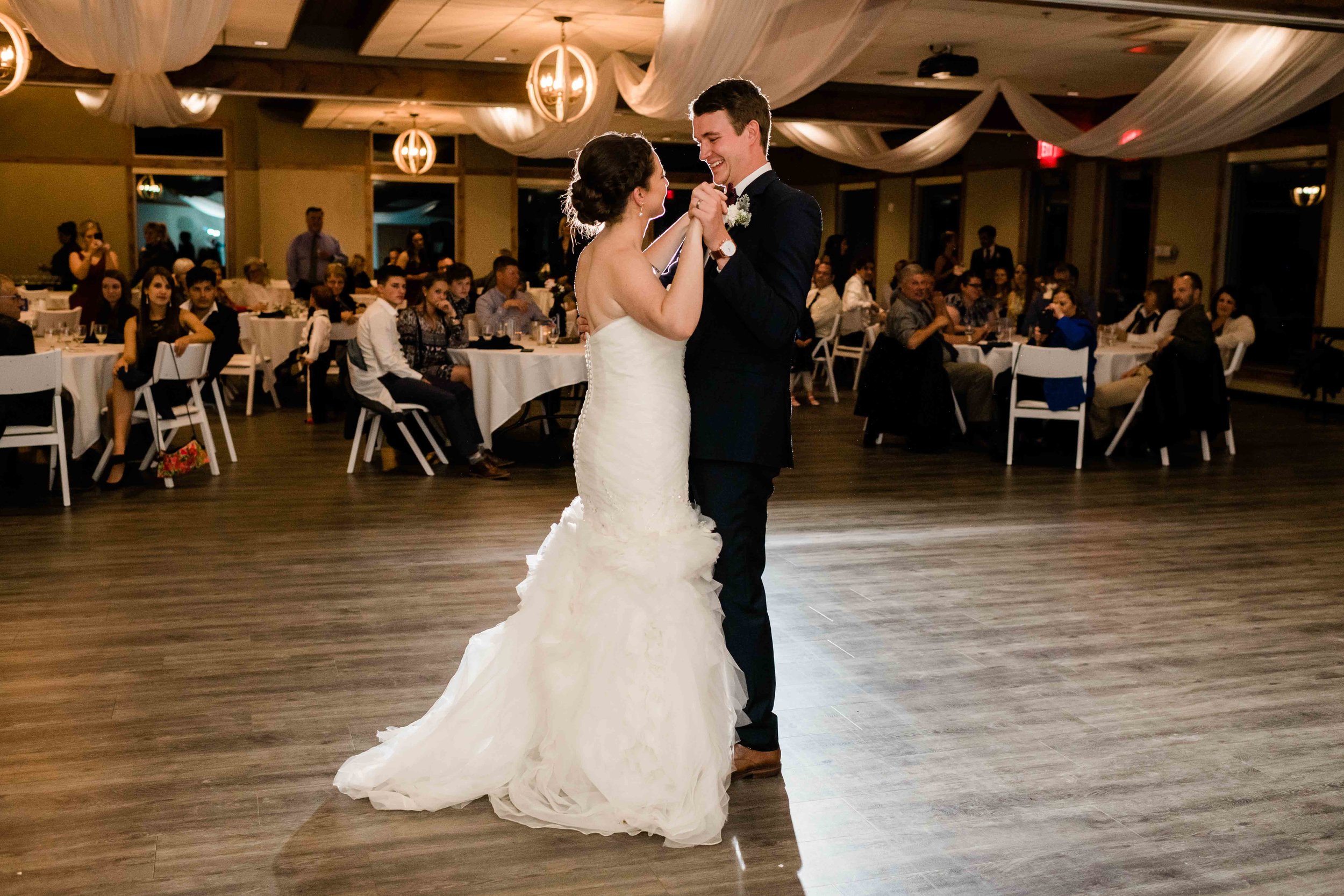 Bride and groom share their first dance as a married couple