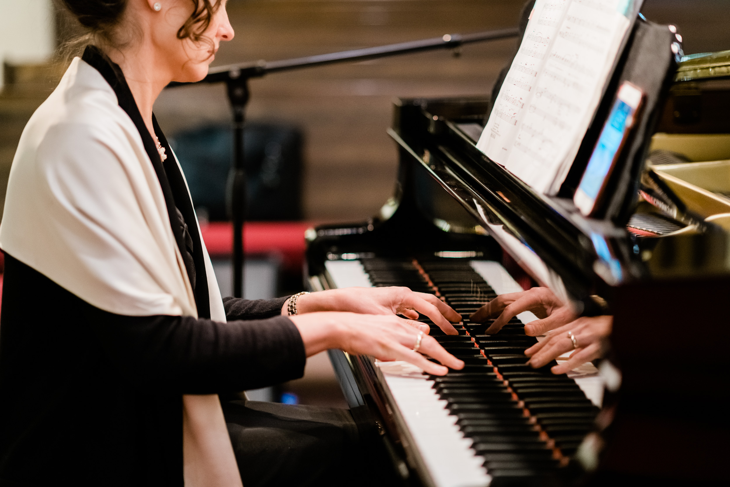 Woman playing piano for wedding