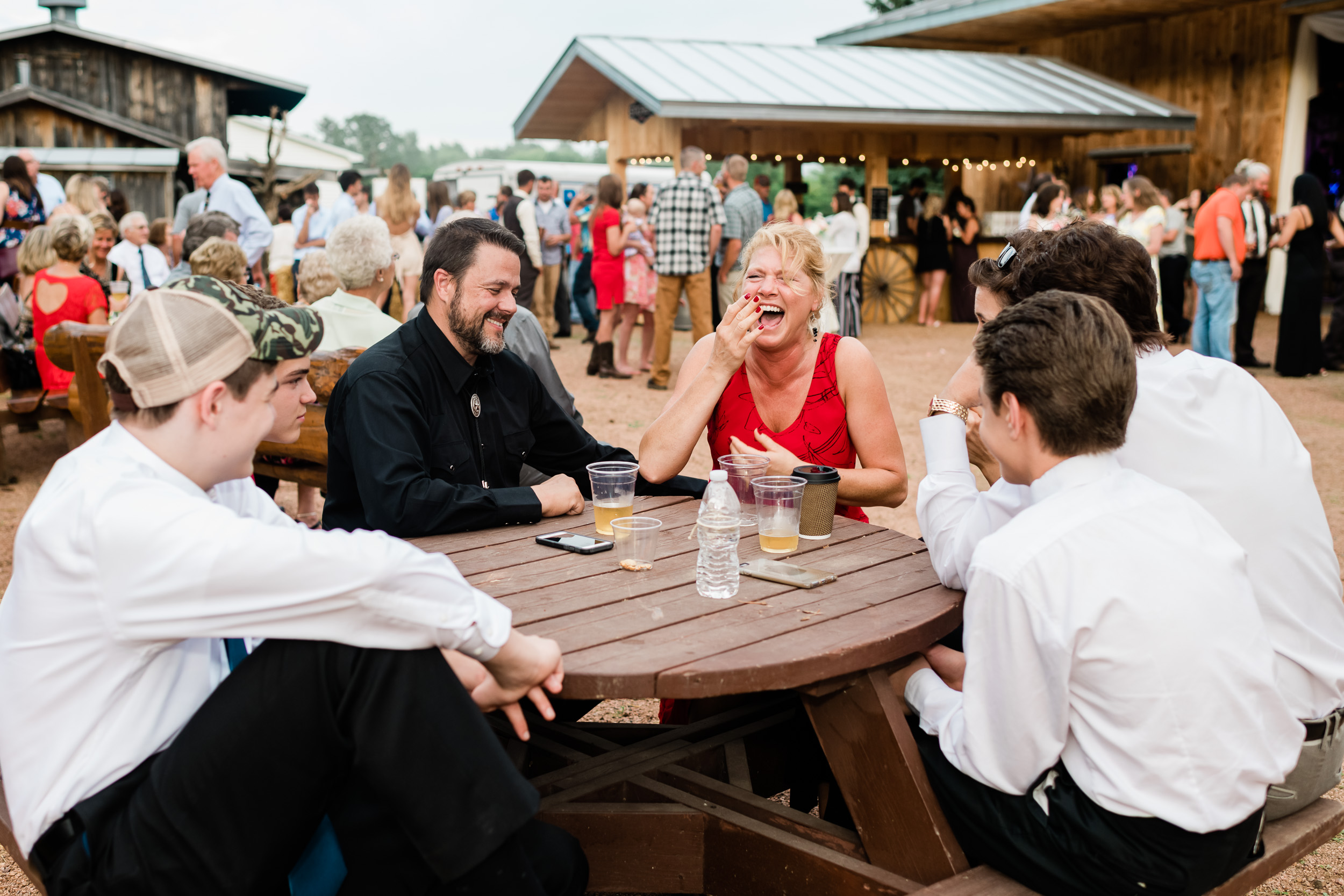 Wedding guests laughing