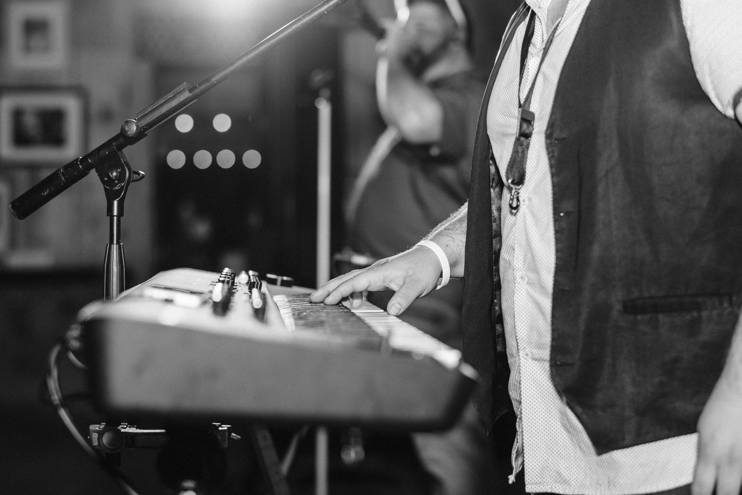 Band member playing keyboard