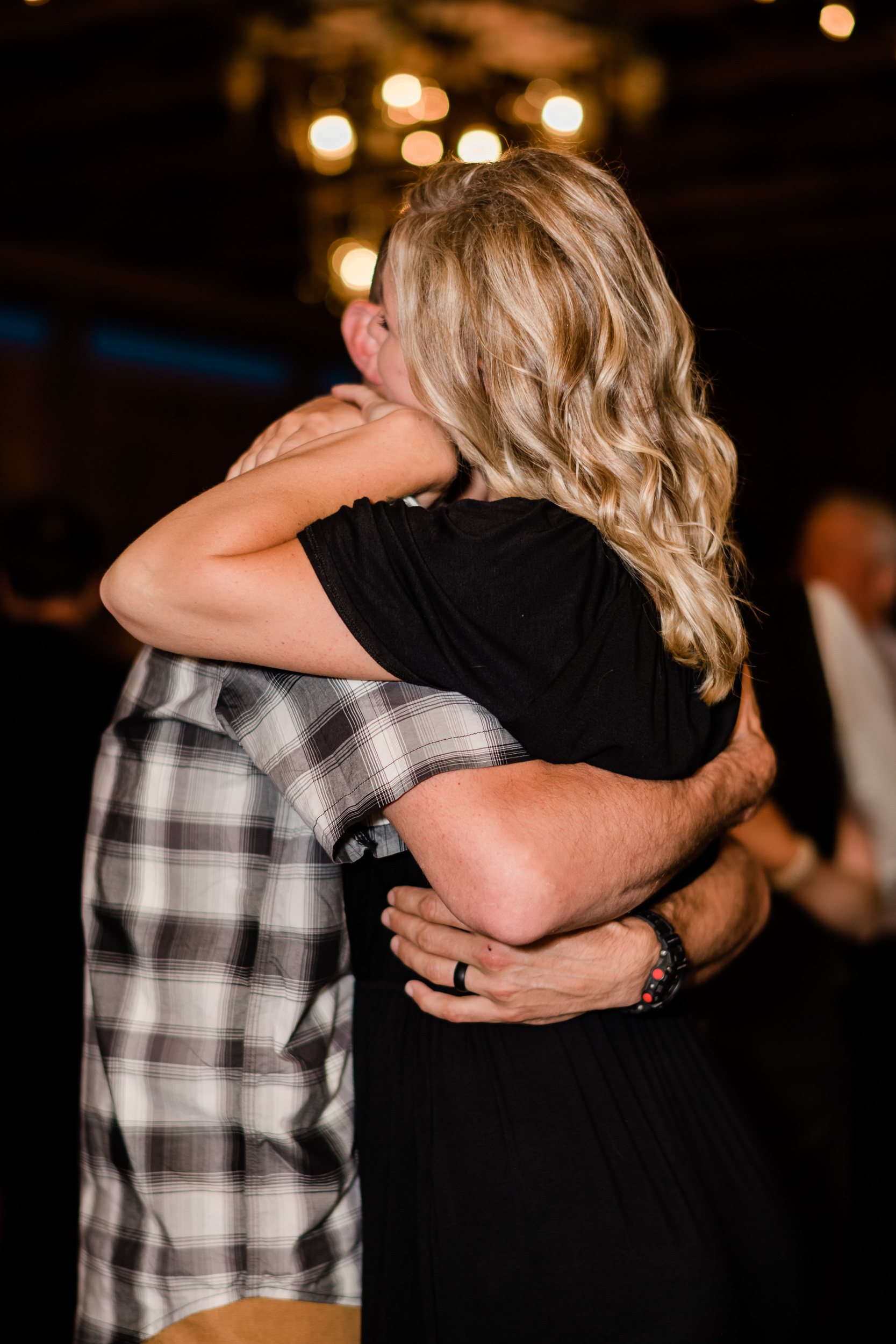 Wedding guests slow dancing