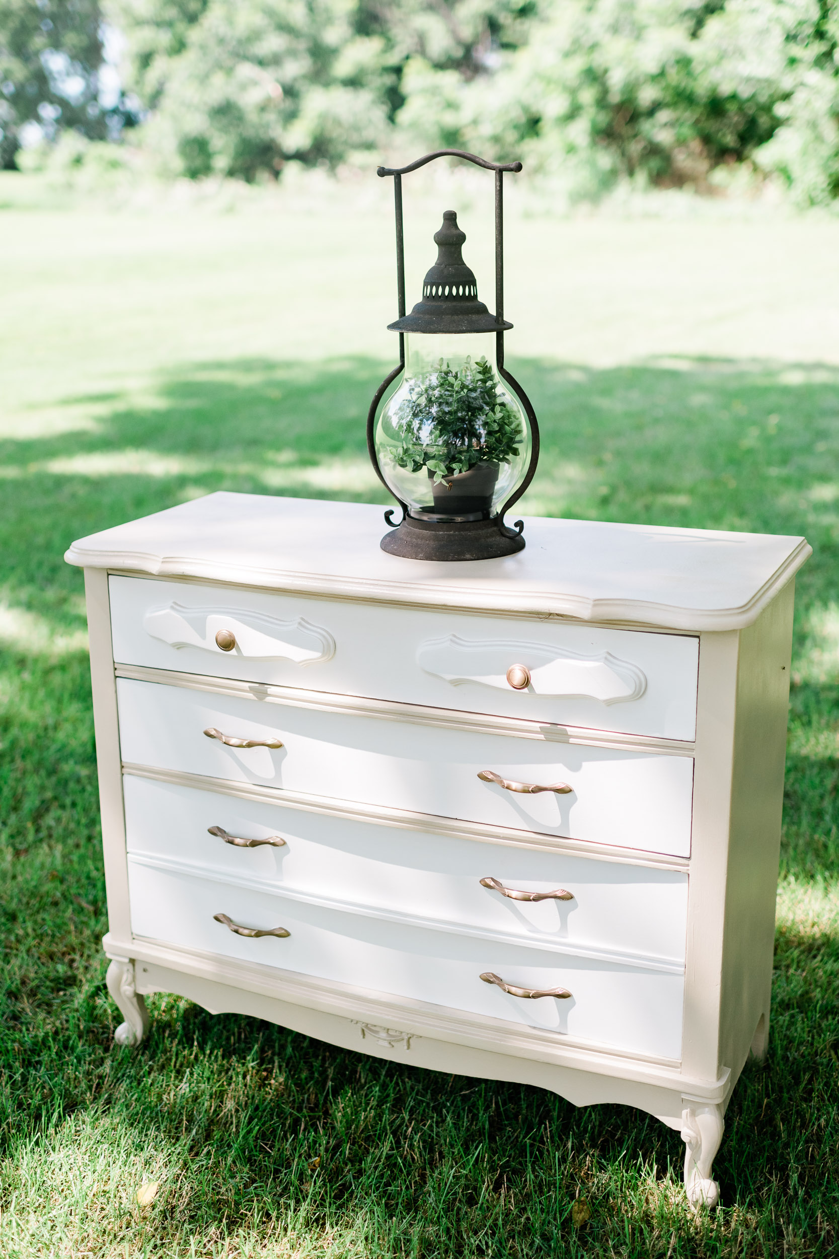 Dresser with a lantern on top