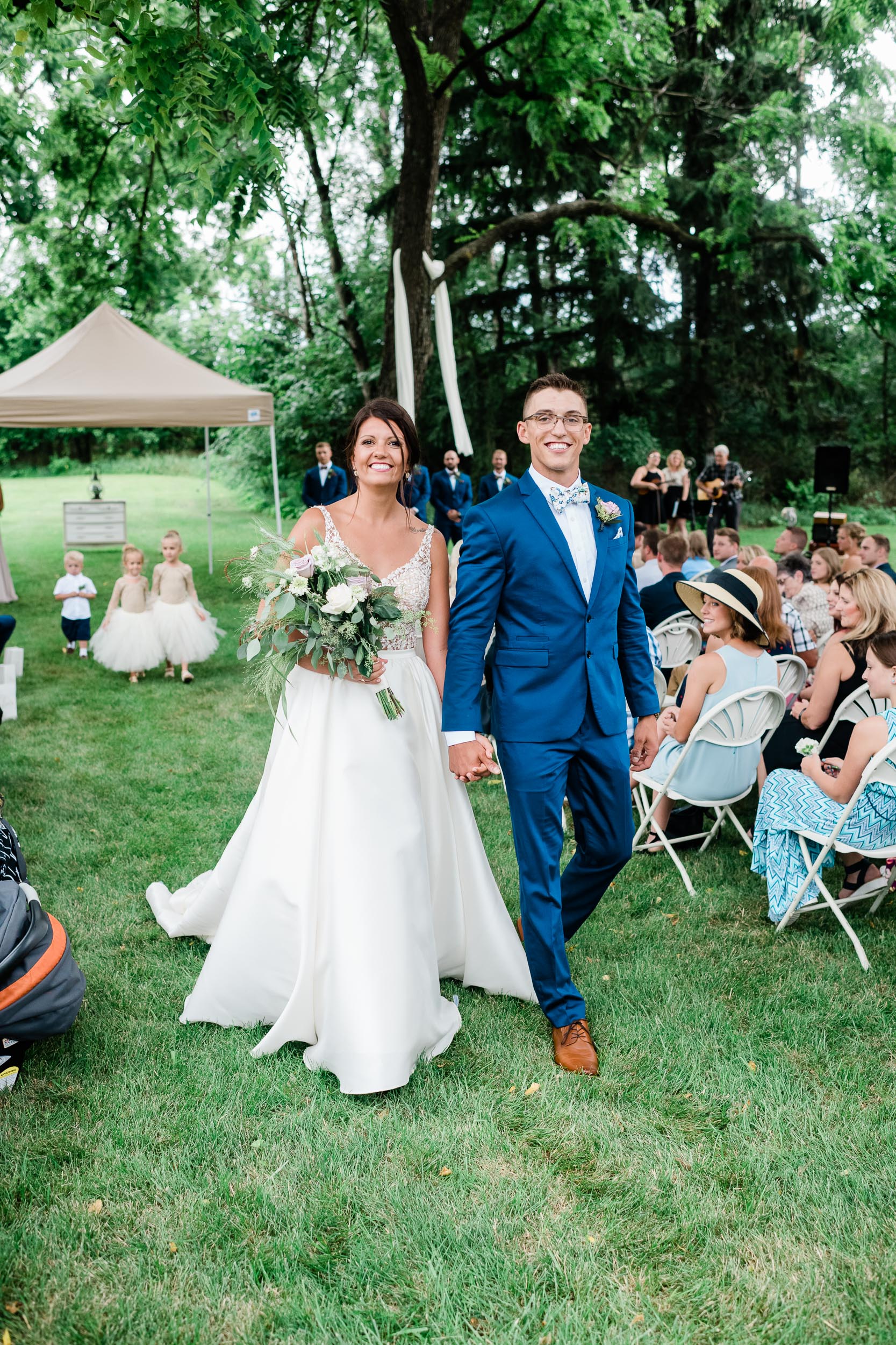 Bride and groom walking together after the ceremony