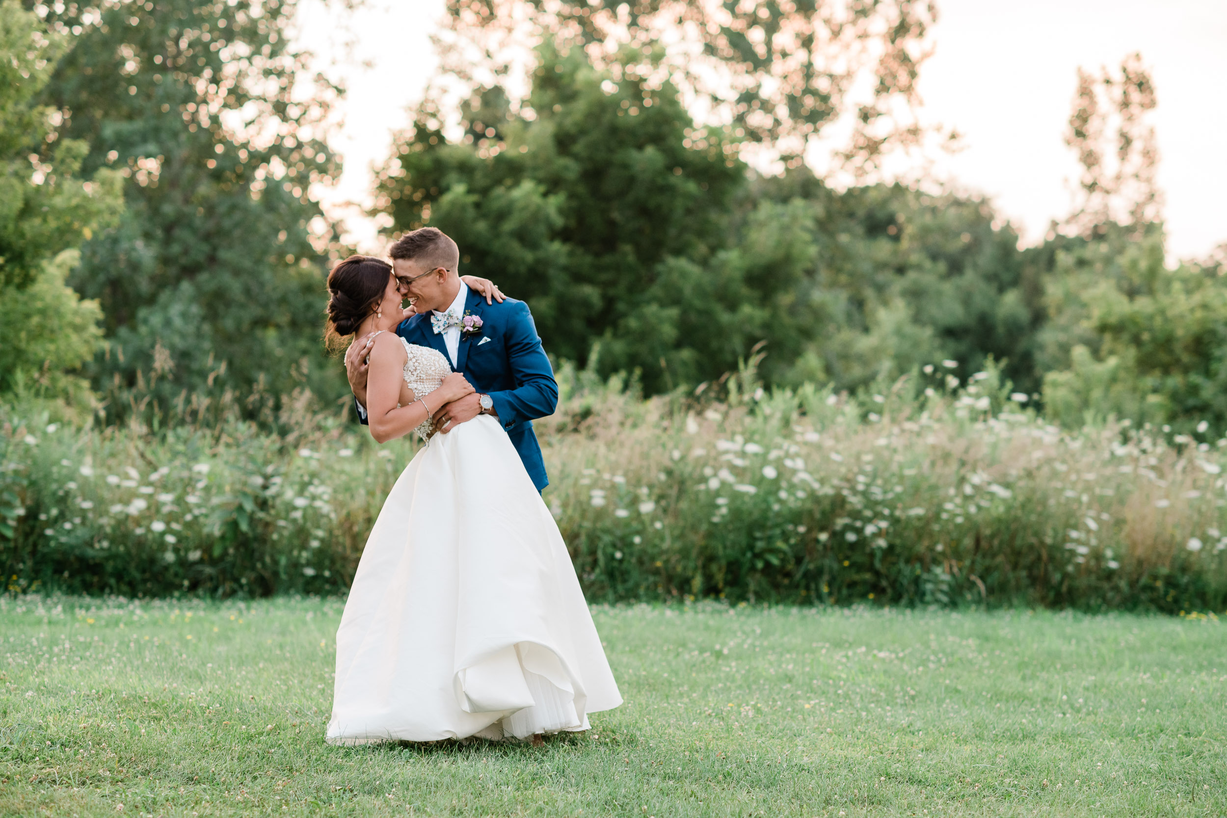 Groom dipping bride back