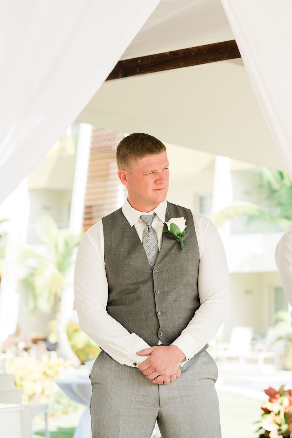 Groom standing at altar
