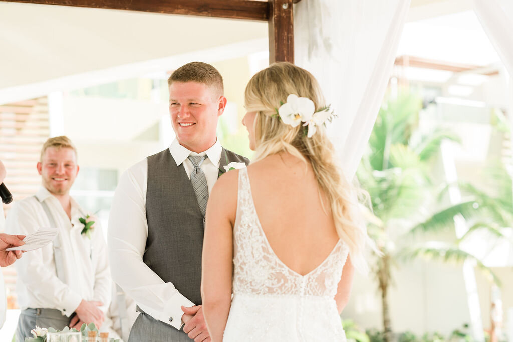 Groom smiling