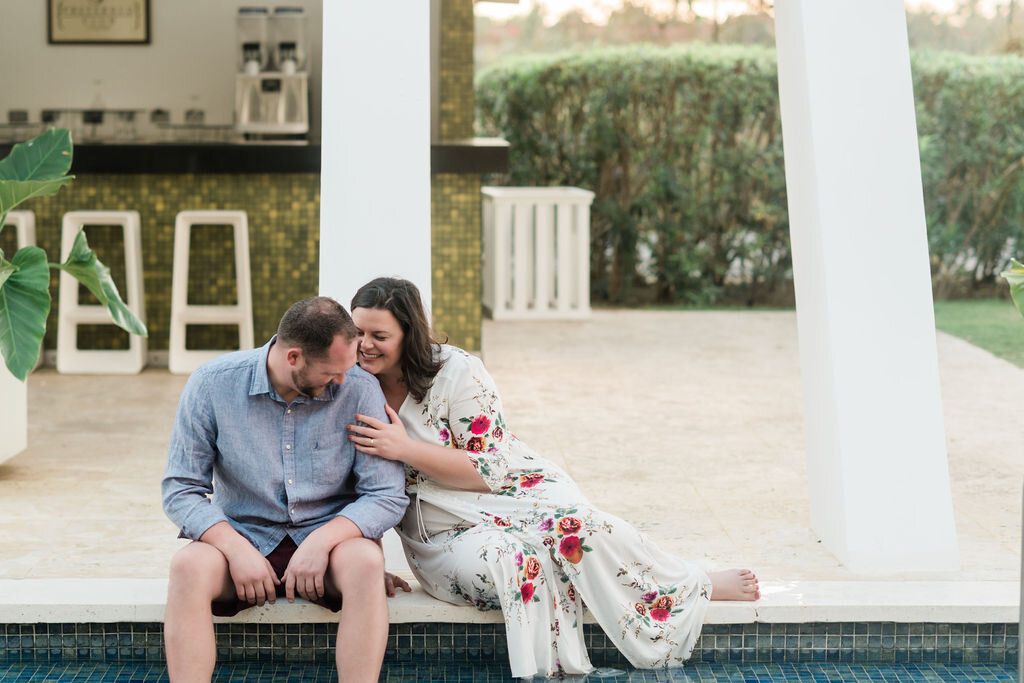 Engaged couple laughing