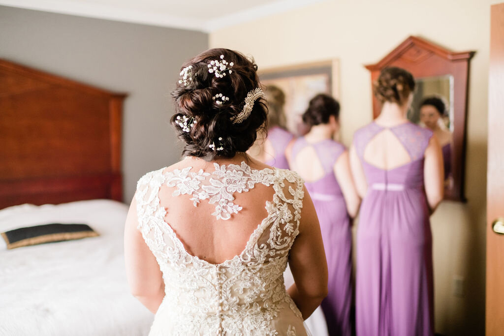 Bride ready for first look with bridesmaids