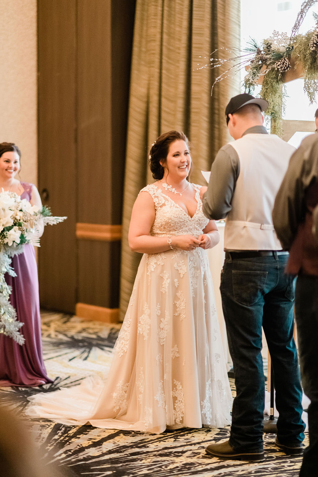 Bride smiling at groom