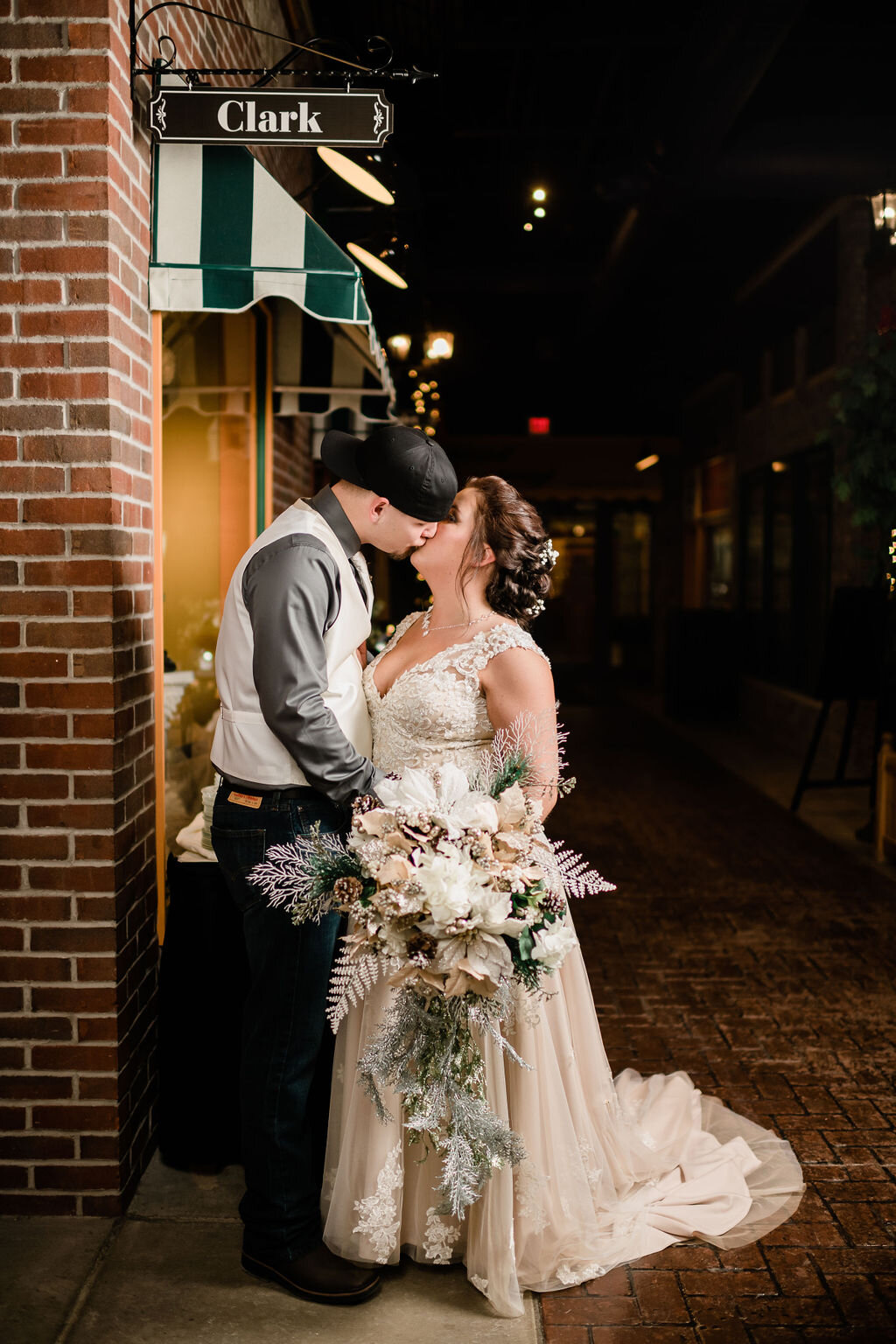 Bride and groom kissing