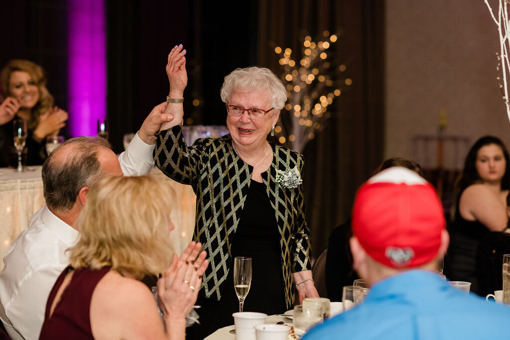 Grandma standing at reception