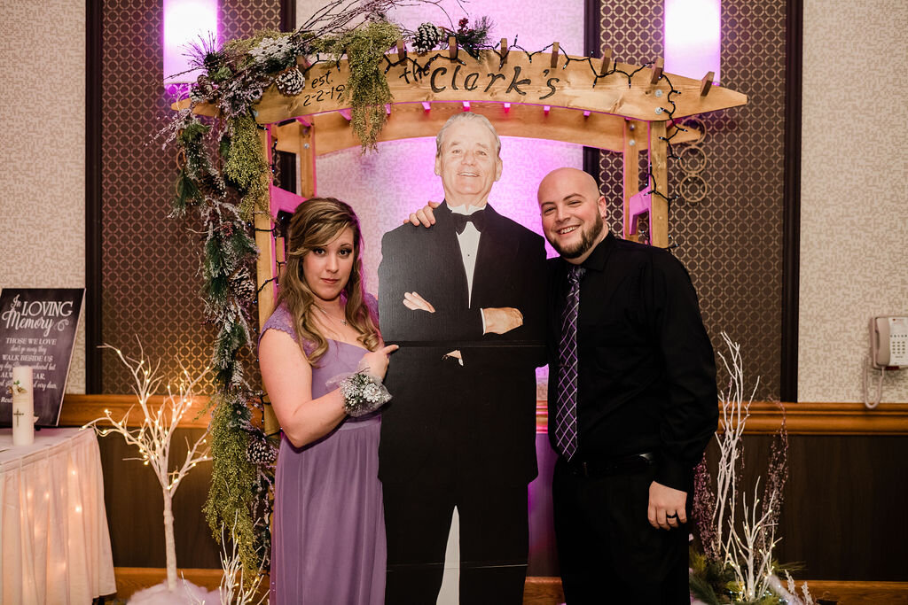 Wedding guests with a cardboard cutout of Bill Murray