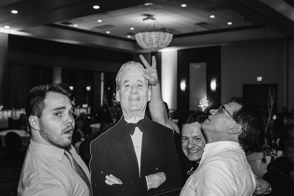 Wedding guests dancing with cardboard cutout of Bill Murray